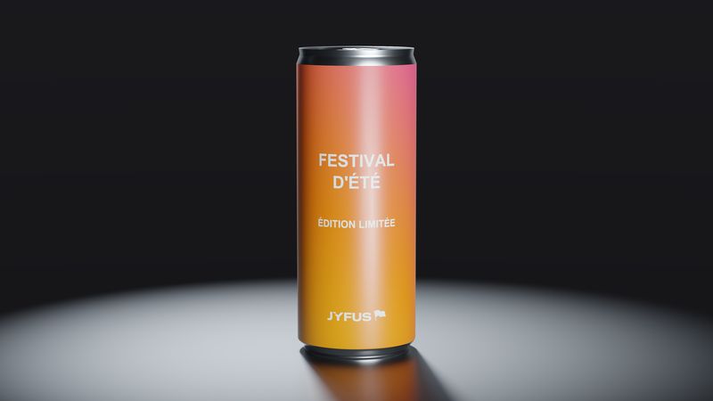 Canette « Festival d'été » sous un projecteur, fond sombre.